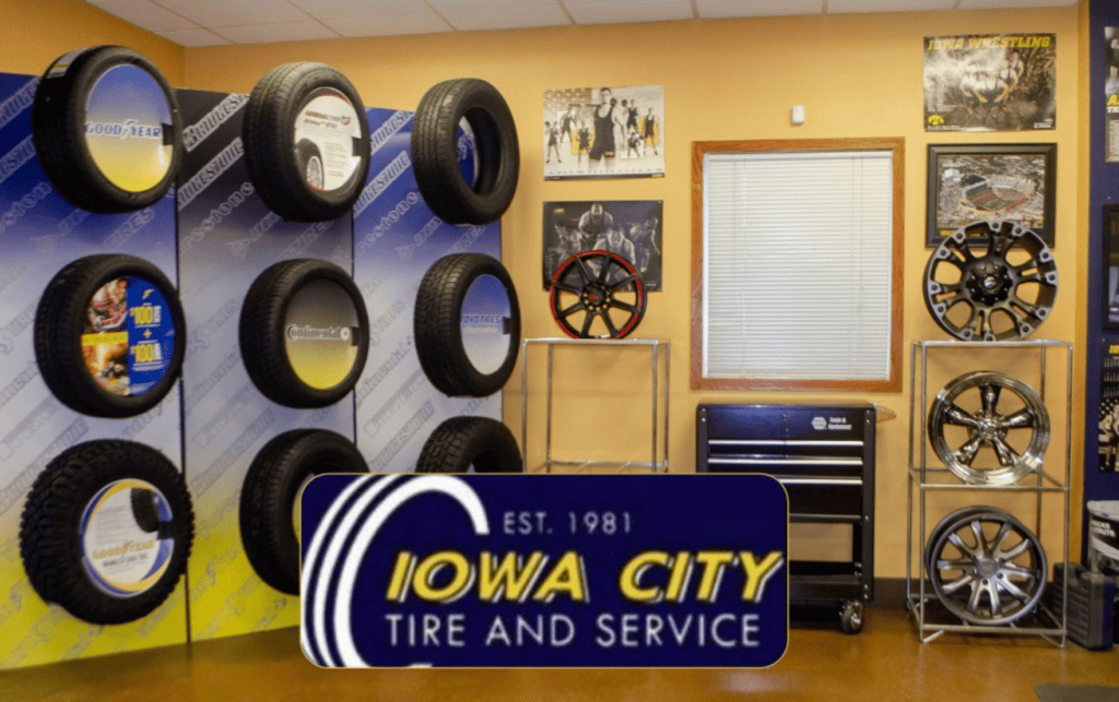 Wheels and Tires service in Iowa City, IA at Iowa City Tire and Service. Image of a selection of wheels and rims showcased on the wall at Iowa City Tire and Service, facilitating easy visibility for clients to make informed choices and find answers to frequently asked questions.